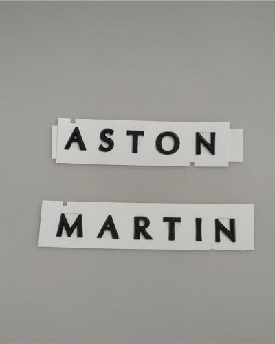 Aston Martin DBX Script Badge Rear Emblem Glossy Black MY83-001B40-CA