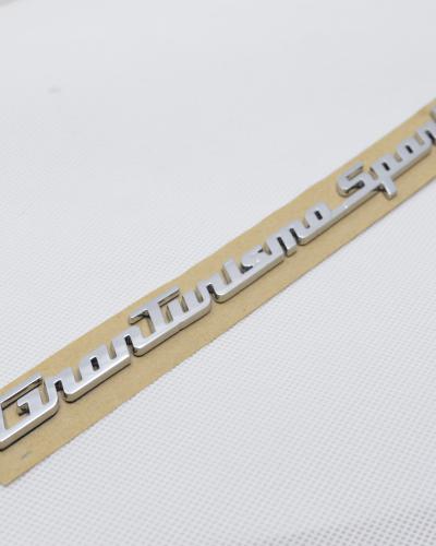 Genuine Maserati Granturismo Sport rear emblem badge #84720800