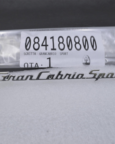 Genuine Maserati GranCabrio Sport Dashoard Emblem # 84180800
