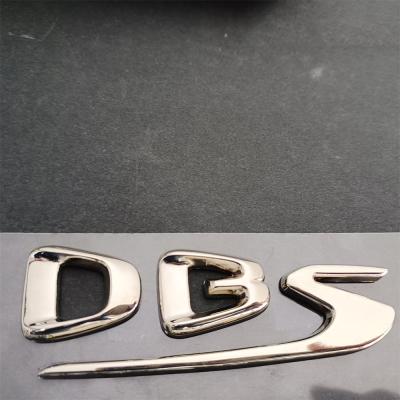 Aston Martin DBS Superleggera PASSENGER SIDE Side Silver Used Badge