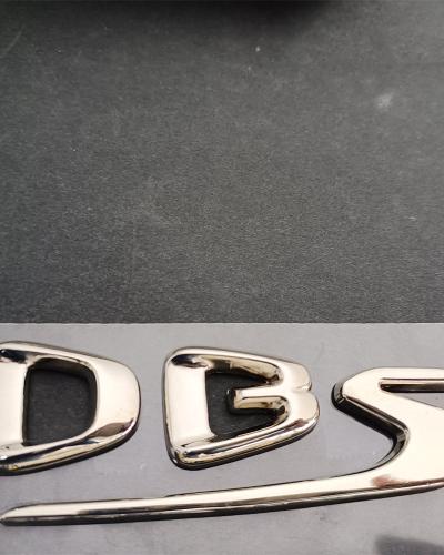 Aston Martin DBS Superleggera PASSENGER SIDE Side Silver Used Badge